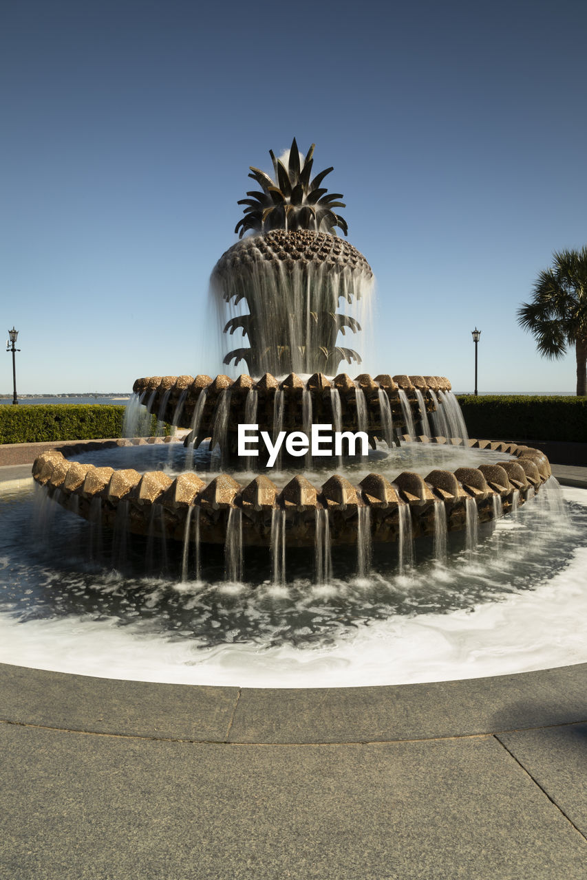 FOUNTAIN IN FRONT OF WATER