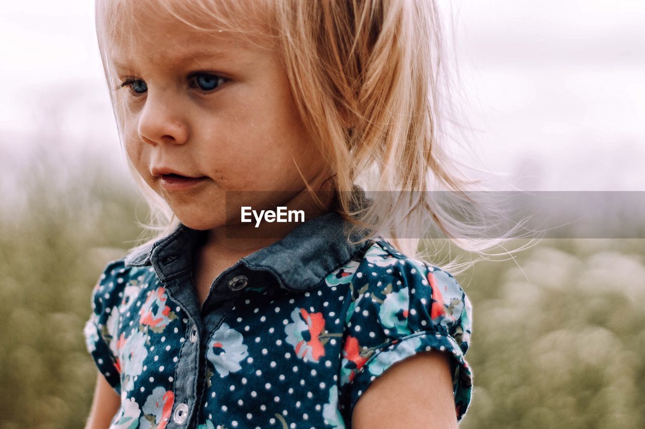 Close-up of girl looking down