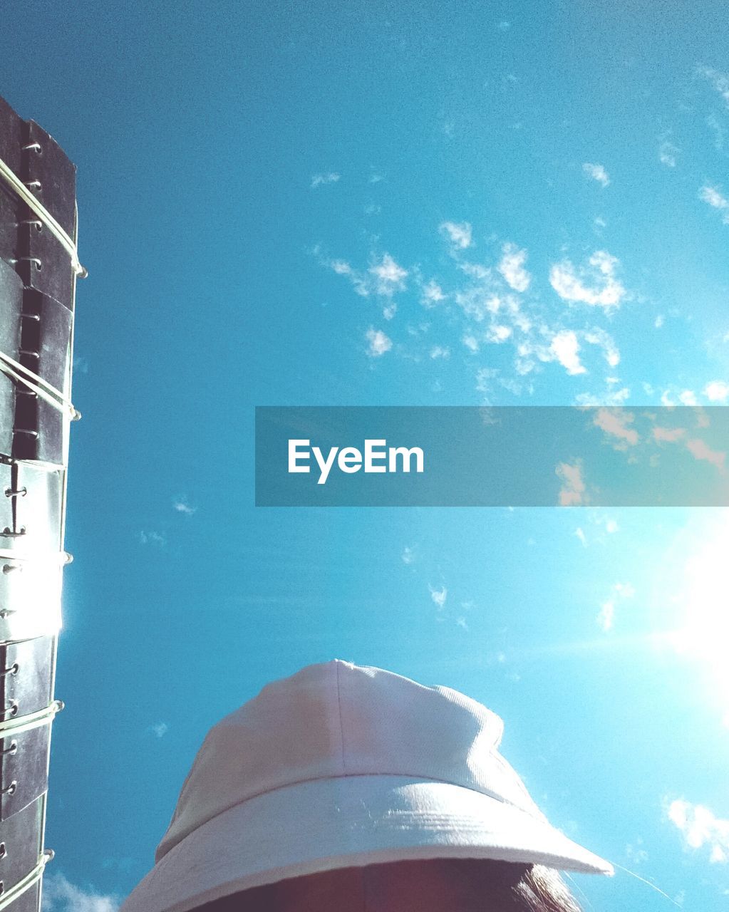 LOW ANGLE VIEW OF DOME AGAINST BLUE SKY