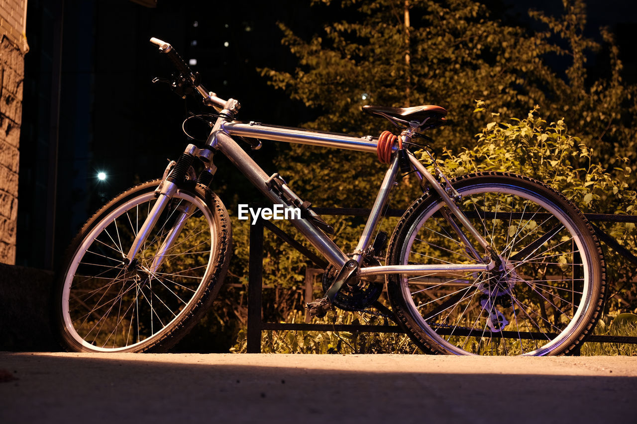 BICYCLES PARKED ON STREET