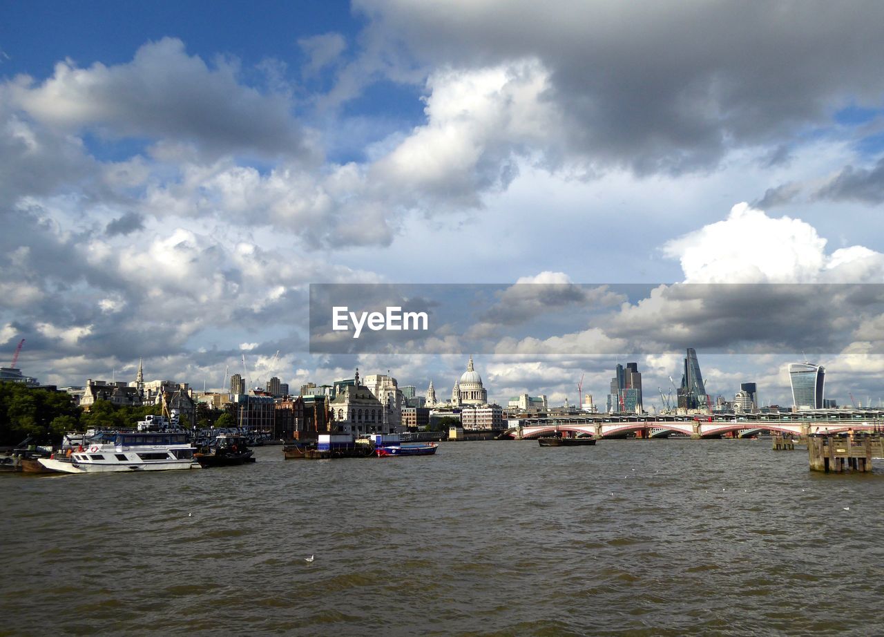 View of city against cloudy sky