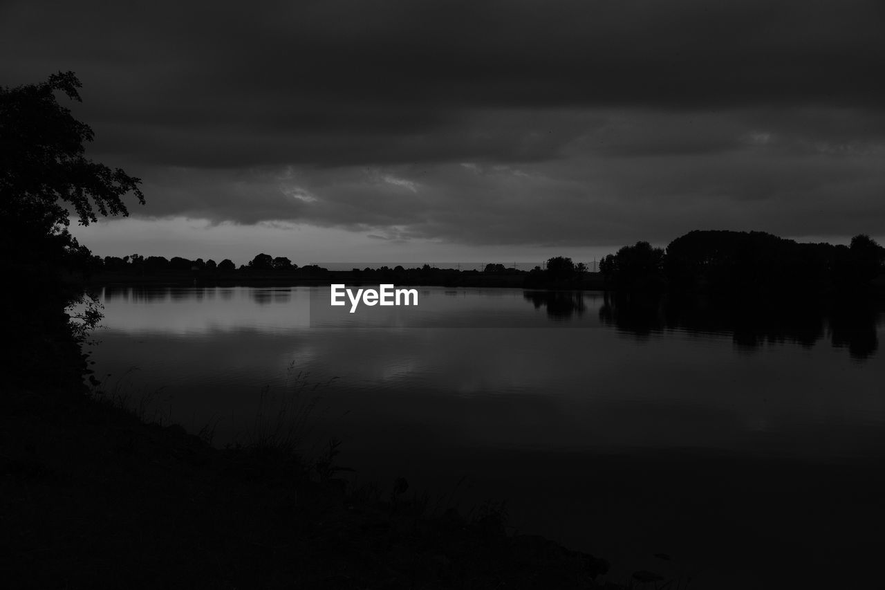 REFLECTION OF CLOUDS IN LAKE