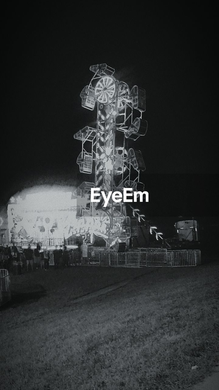 FERRIS WHEEL AT NIGHT