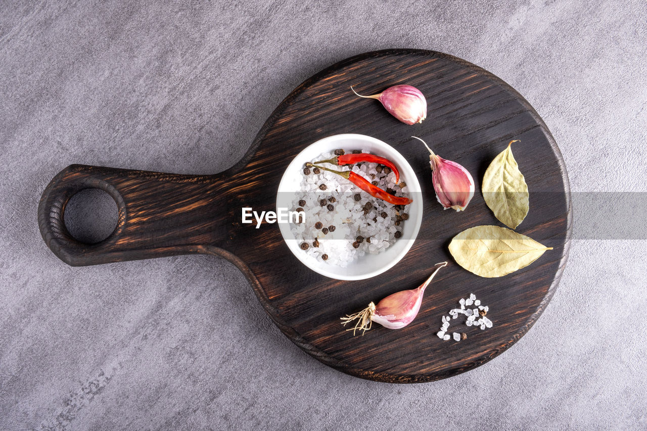 food and drink, food, healthy eating, freshness, directly above, fruit, indoors, wellbeing, high angle view, tableware, no people, still life, table, sweet food, kitchen utensil, wood, studio shot, meal, sweet, eating utensil, gray, plate, dessert