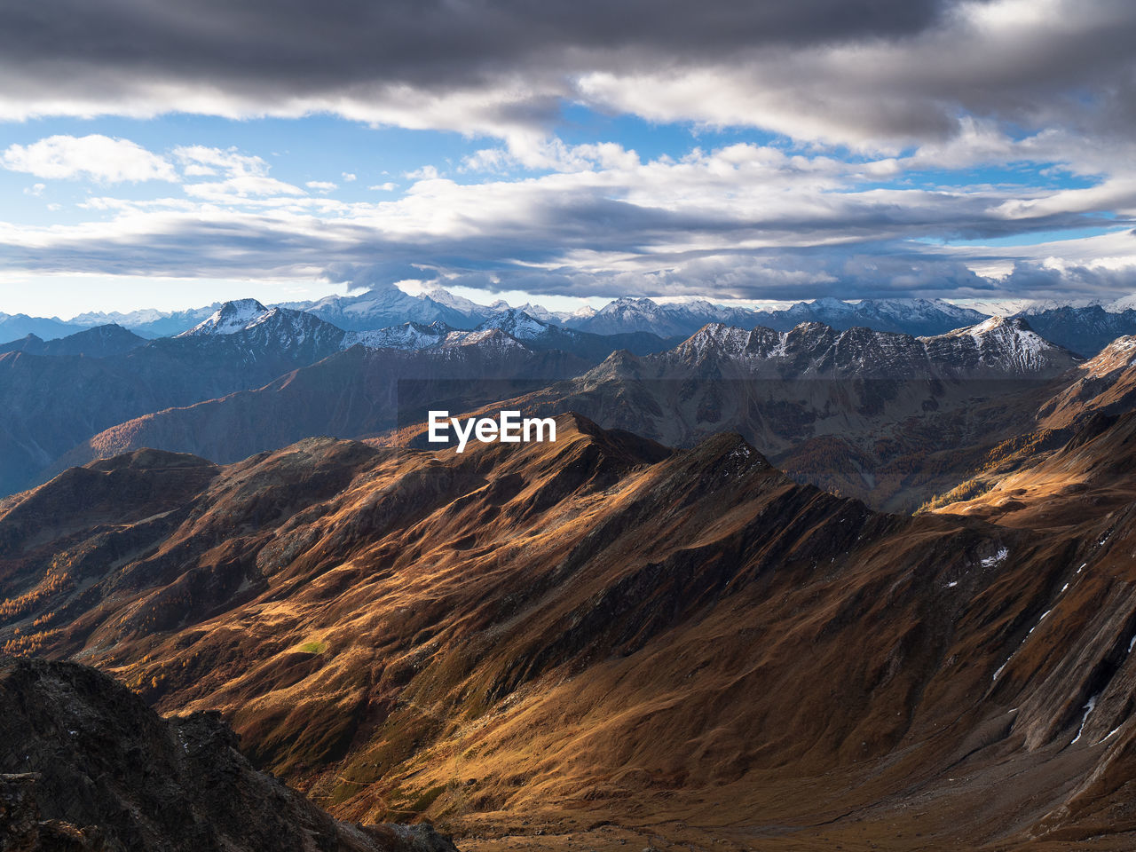 Scenic fallo view of mountains against dramatic sky.