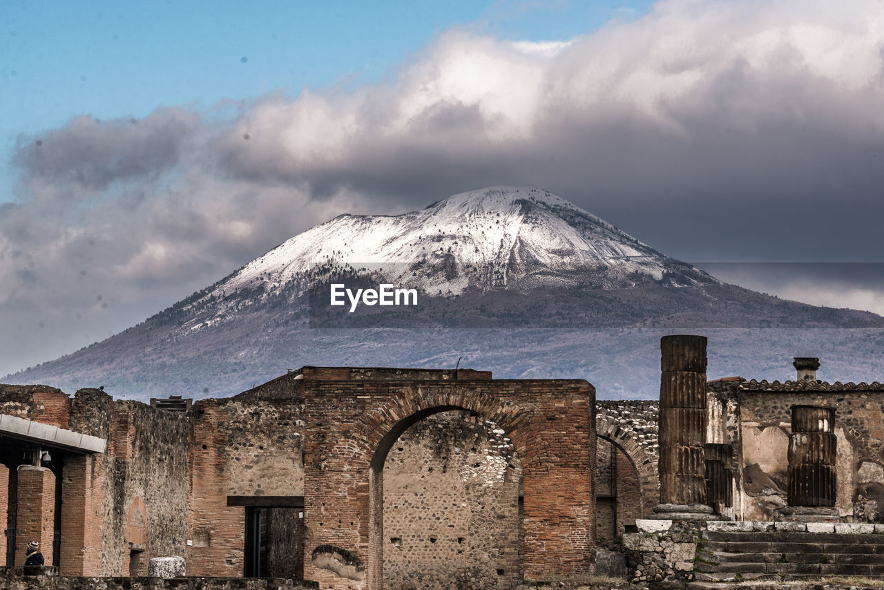 Vesuvius in snow over pompeii ruins