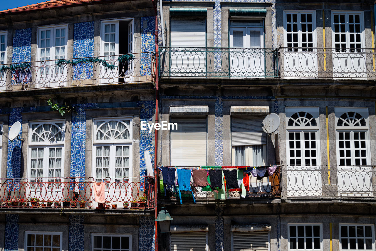 Beautiful and colorful facades of porto houses on a sunny summer day.