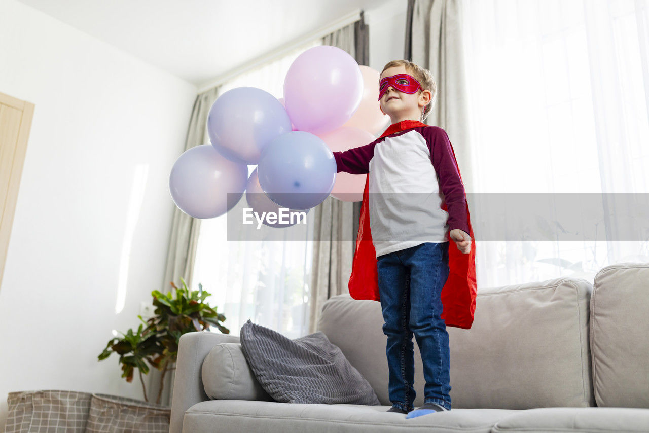 portrait of woman with balloons