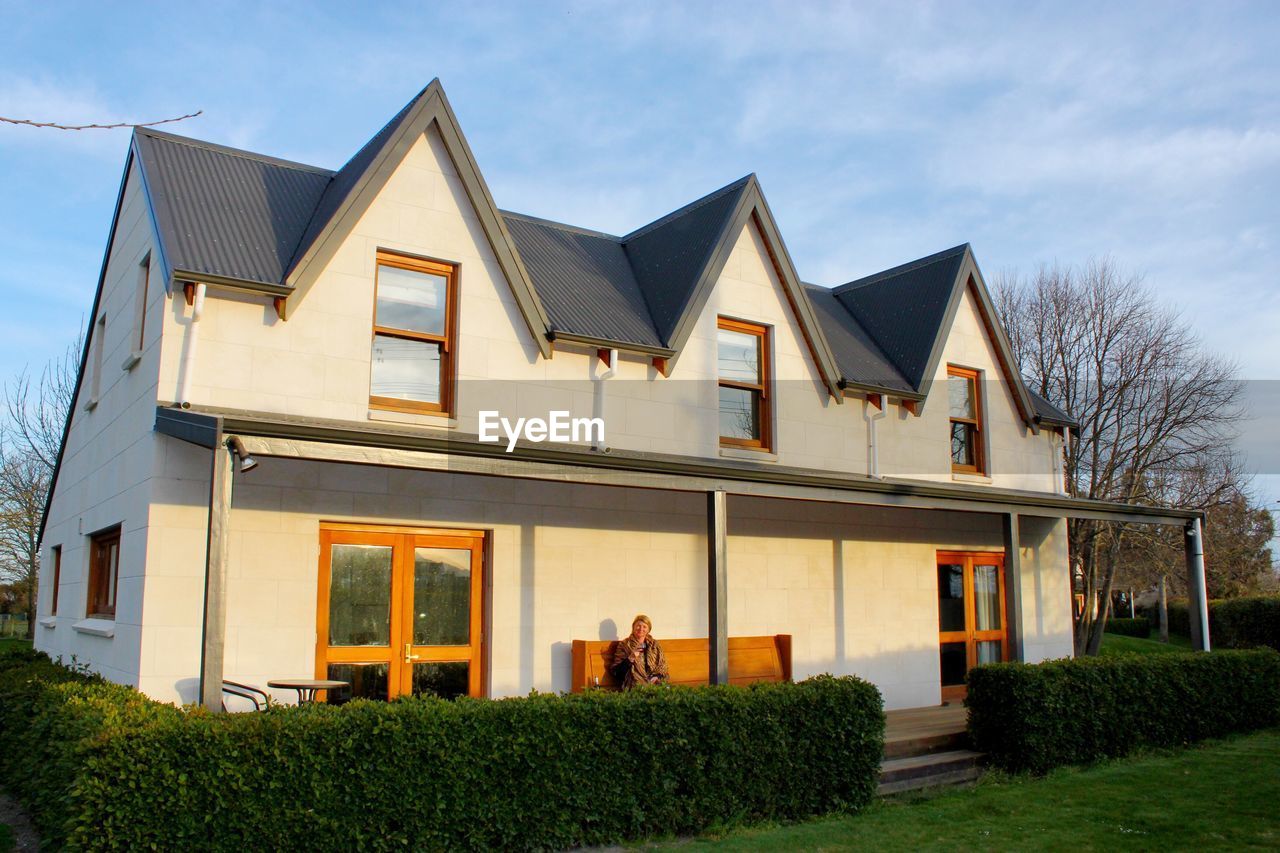 VIEW OF HOUSE AGAINST SKY