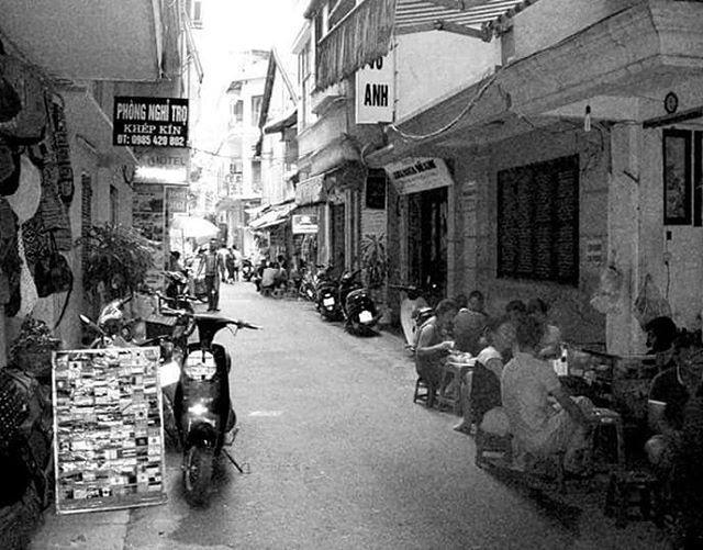 CARS PARKED ON STREET IN CITY