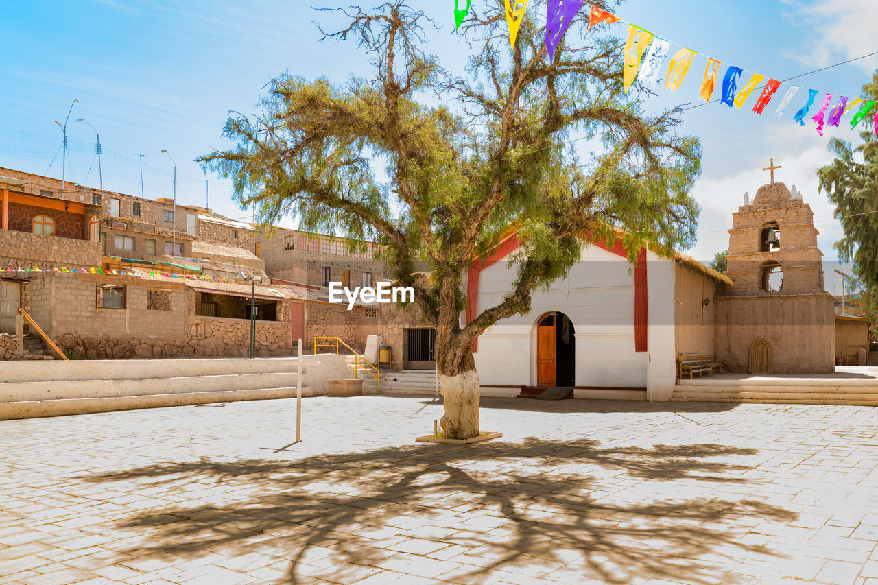 Main church, rustic houses and plaza of ayquina, a little village in the  atacama desert in chile.