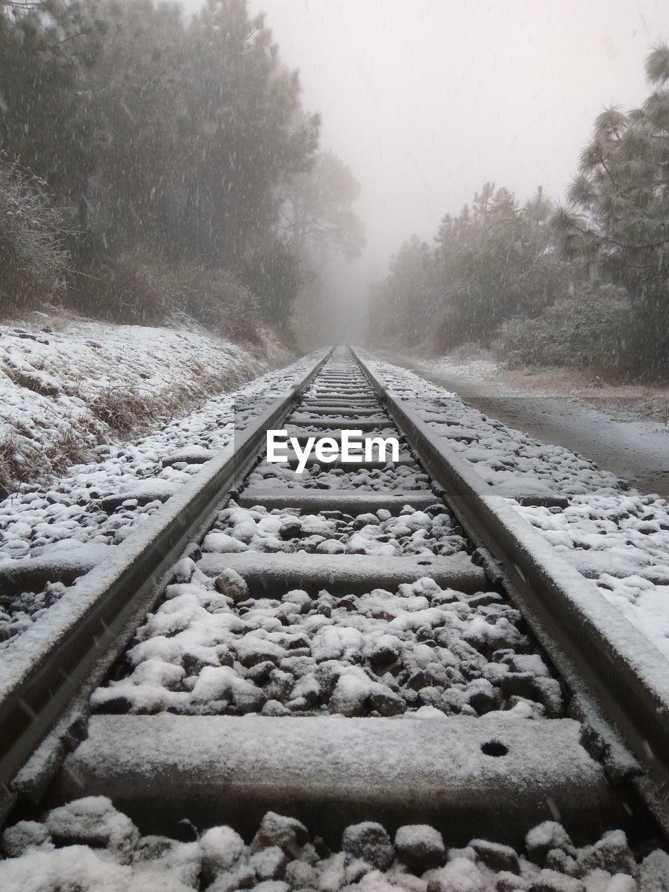 Snow covered railroad track