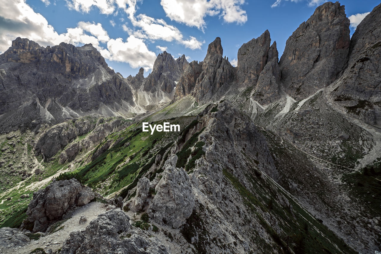 Cadini di misurina panorama on hiking mountain path, trentino, italy