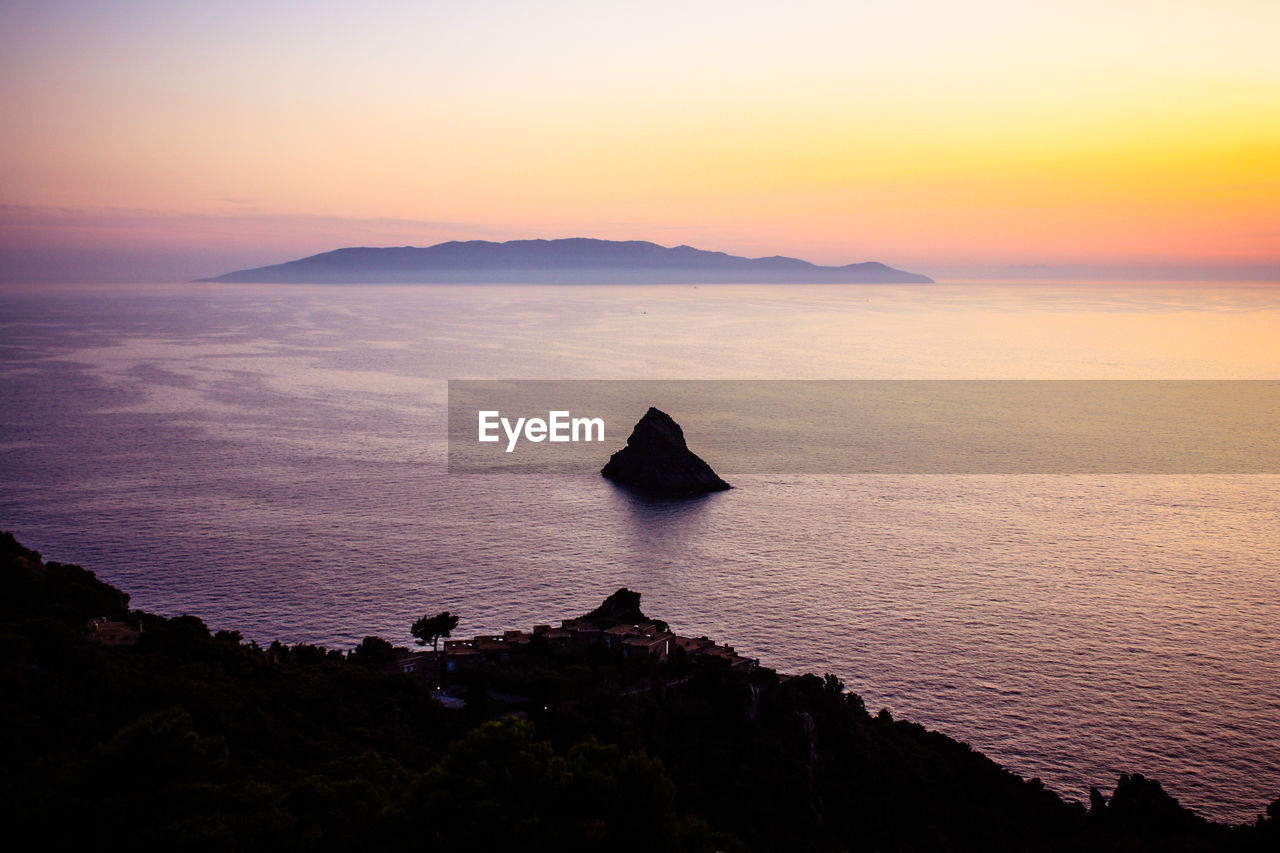 Scenic view of sea against dramatic sky