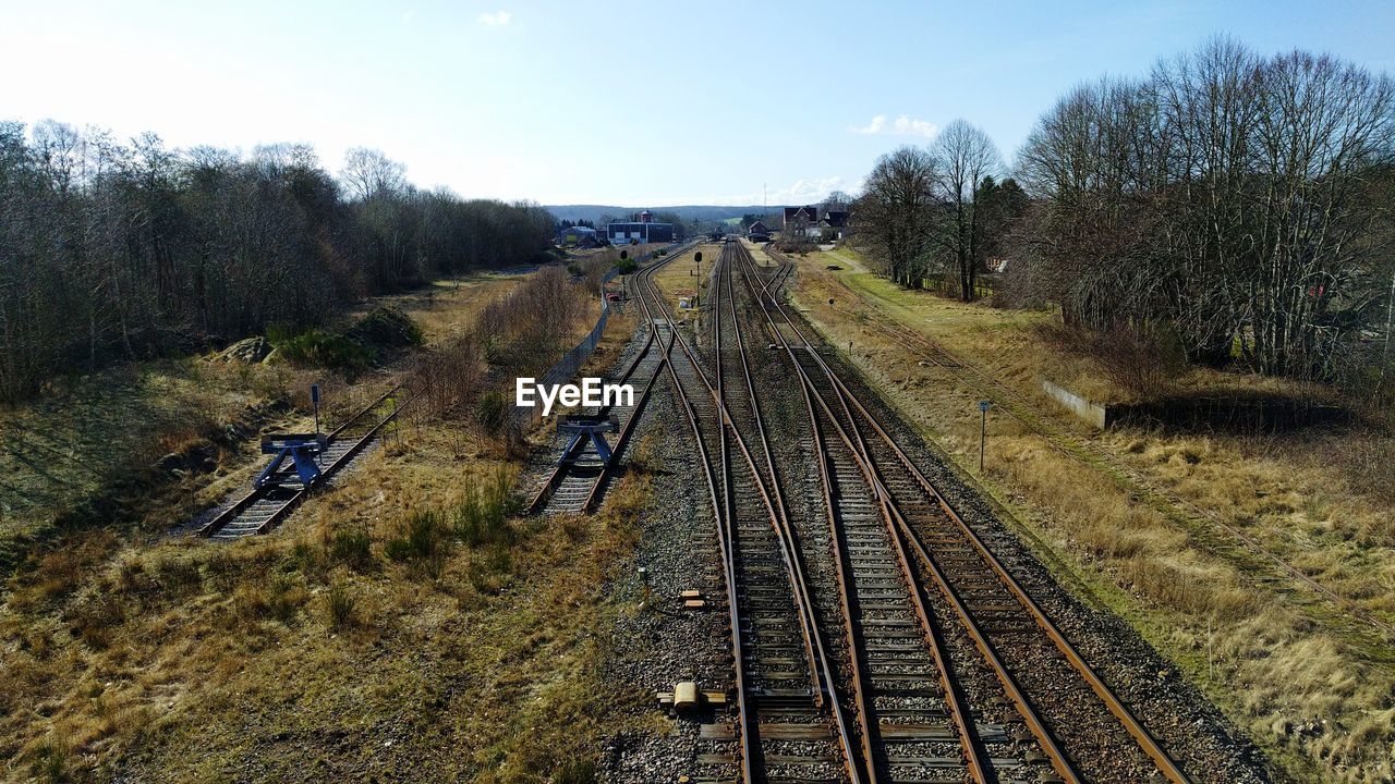 RAILROAD TRACKS AGAINST SKY