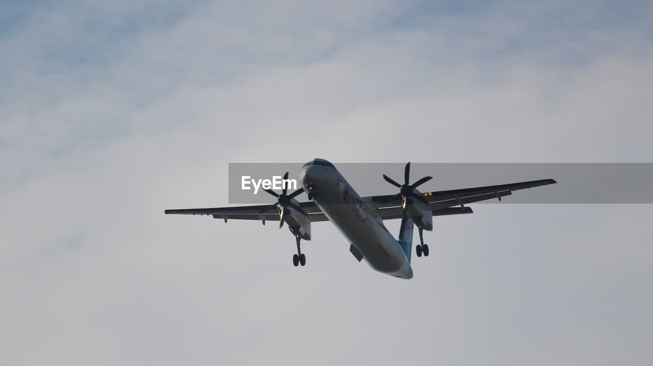 Propeller plane on landing approach to vienna airport