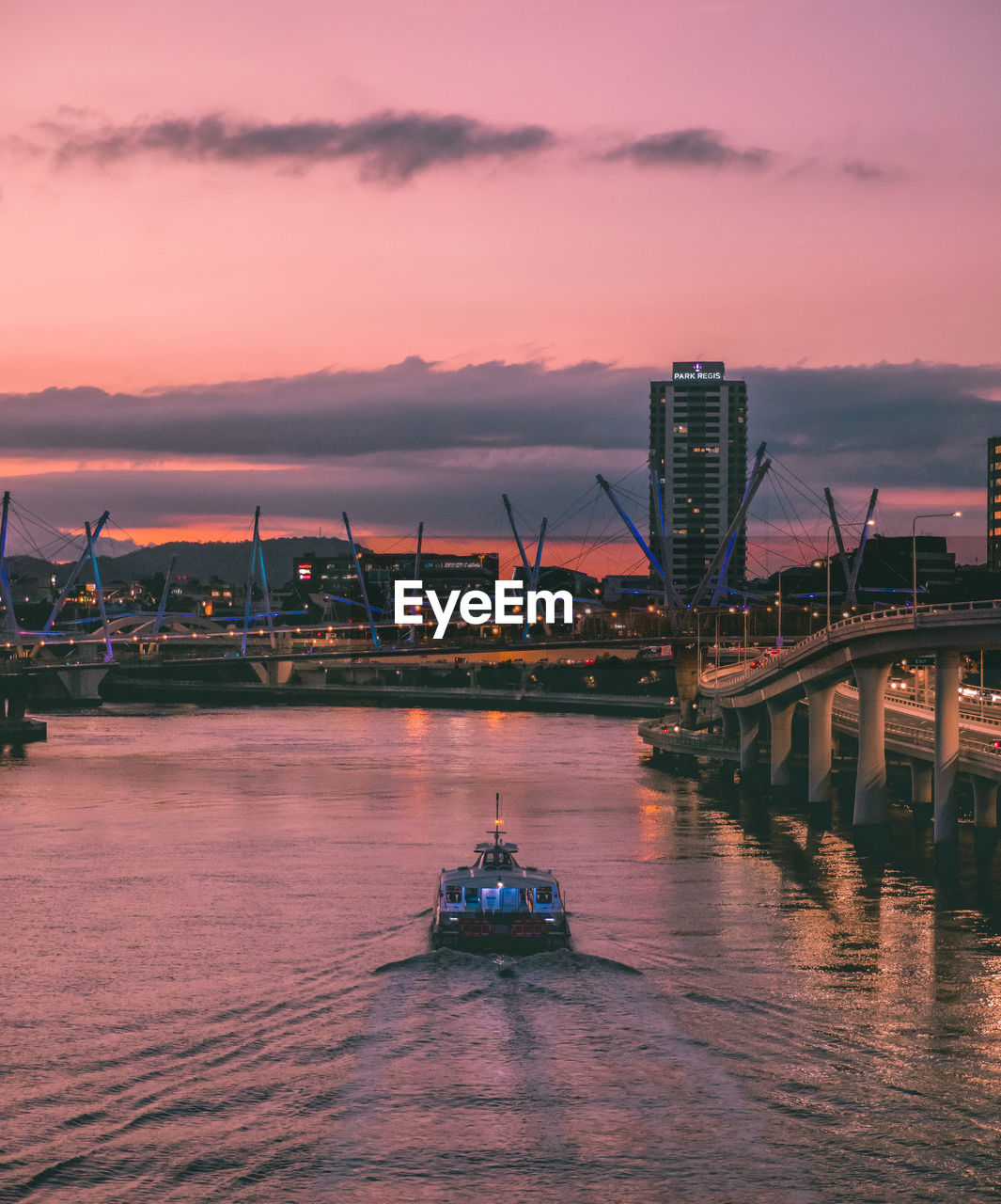 Scenic view of river against sky during sunset