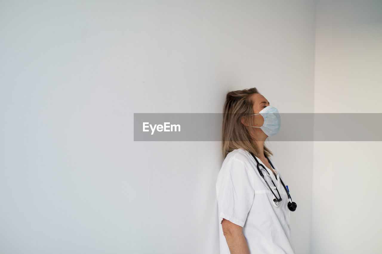 Female doctor wearing protective face mask