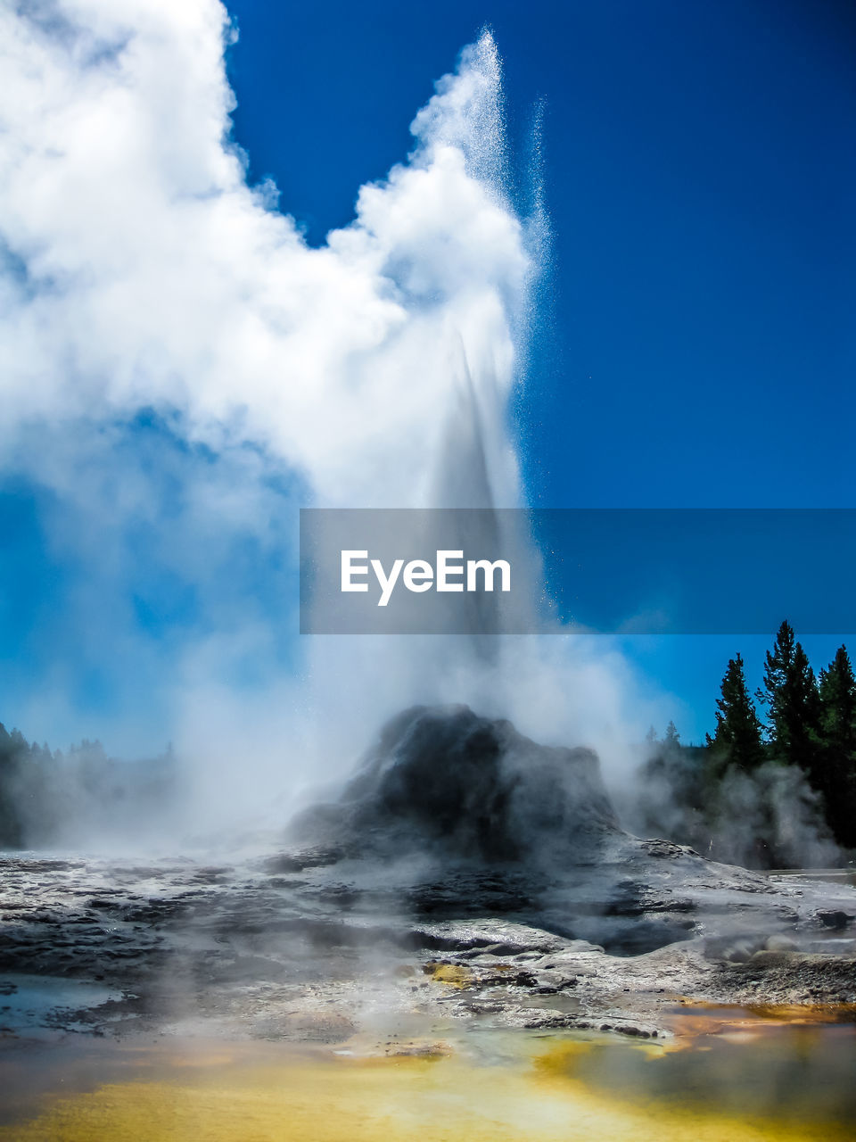 Geyser spraying at yellowstone national park