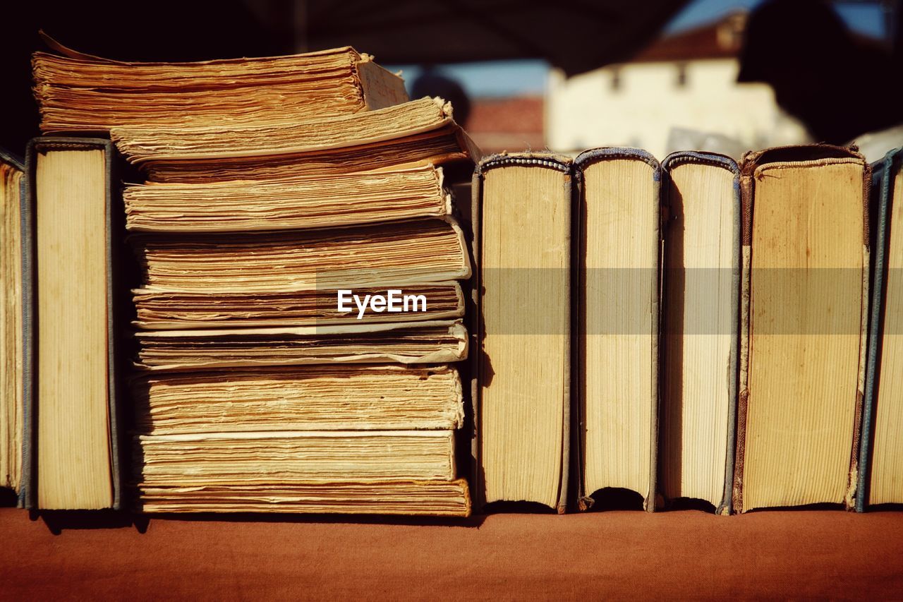 Close-up of books on display at stall in flea market