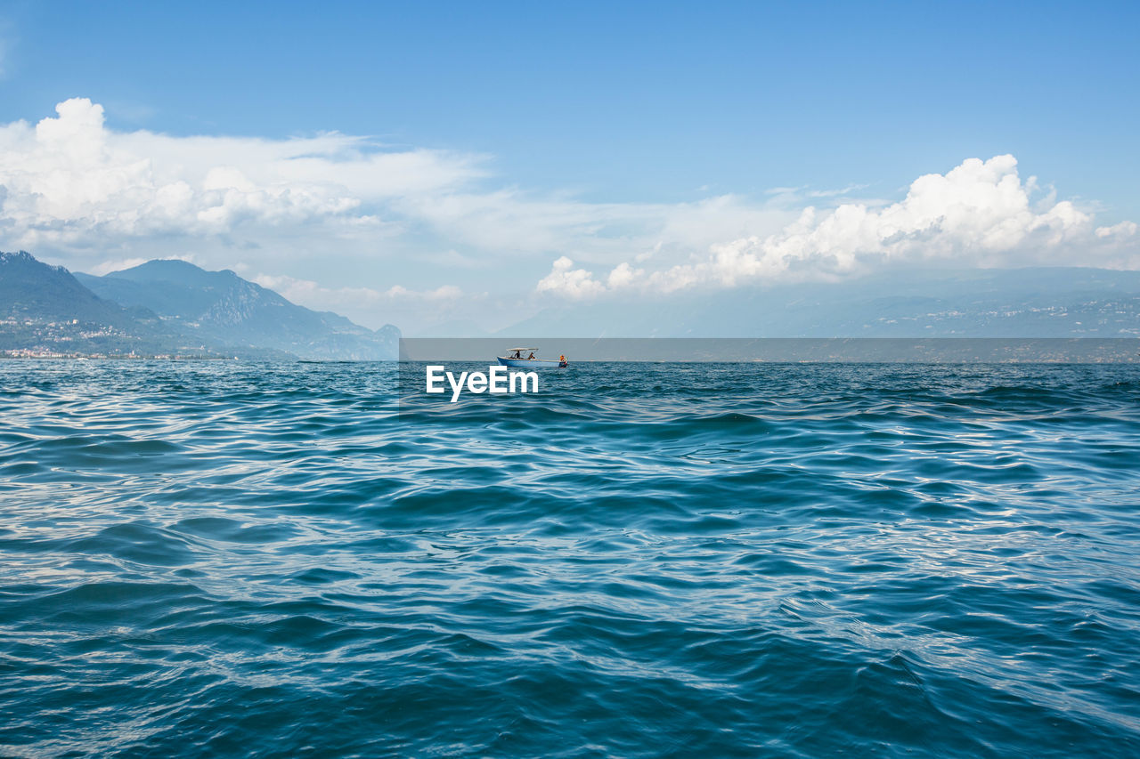 Scenic view of sea against sky at lake garda italy