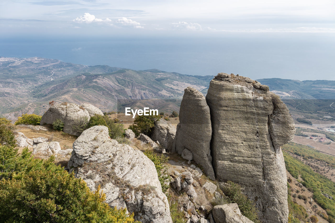 Scenic view of rocky mountains against sky