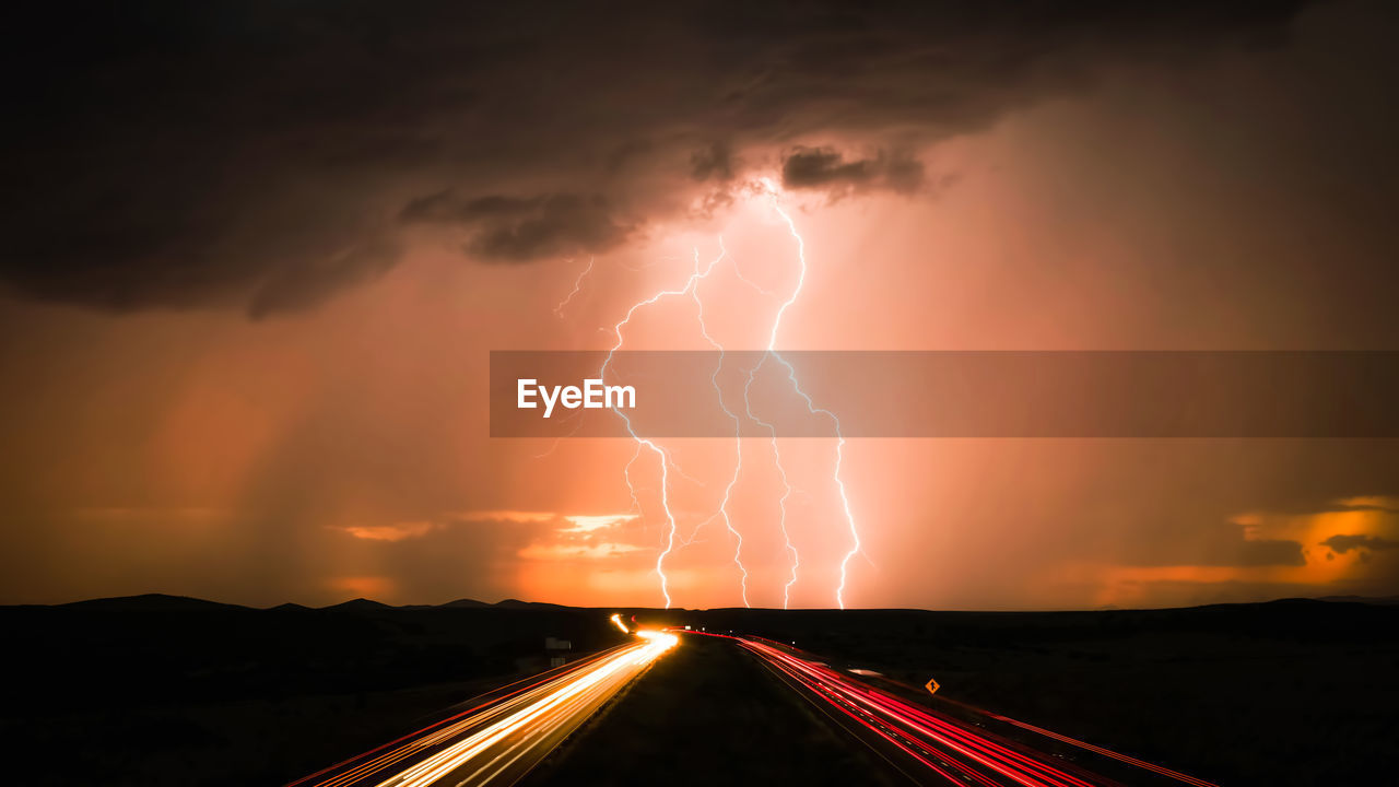 High angle view of light trails at night.cloudy, clodus of rain, balck color of clouds, rainy strom