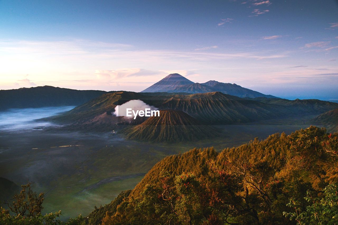 Scenic view of mount bromo against cloudy sky