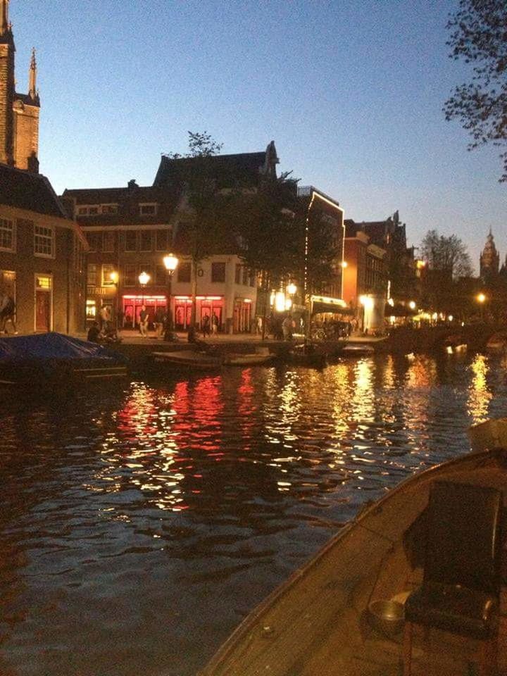 VIEW OF ILLUMINATED BUILDINGS AT NIGHT