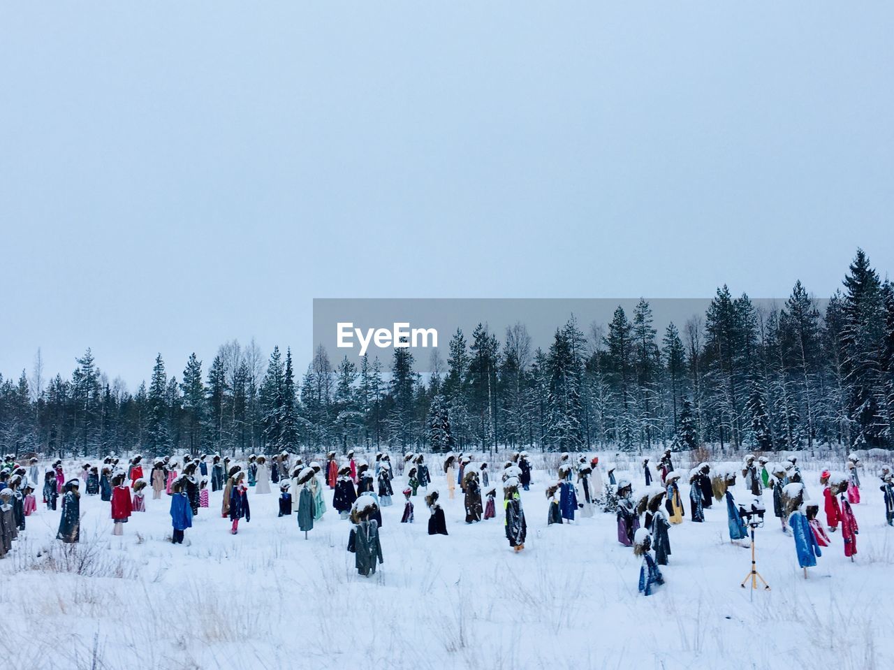 Group of people on snow covered landscape