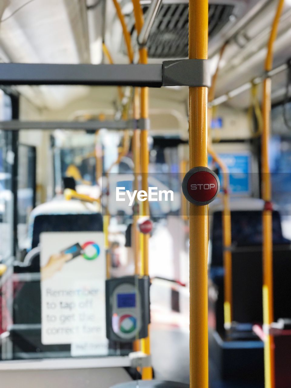 Close-up of machine part on the bus. sign to  stop the bus. 