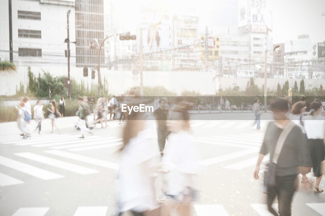 PEOPLE WALKING ON STREET