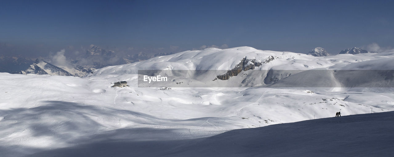 Sunny day on dolomites, walking on the mountain