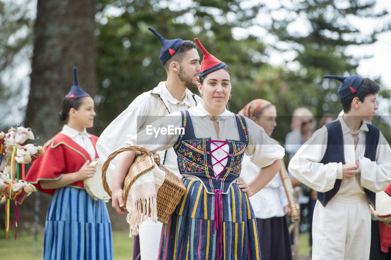 GROUP OF PEOPLE AT TRADITIONAL CLOTHING