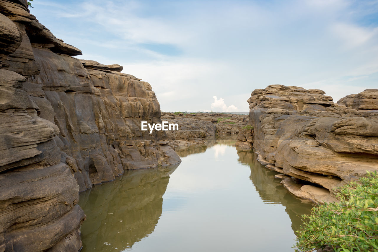 ROCK FORMATION AGAINST SKY