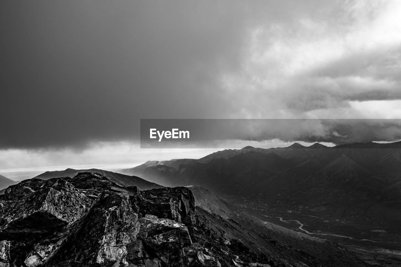 SCENIC VIEW OF MOUNTAIN AGAINST SKY