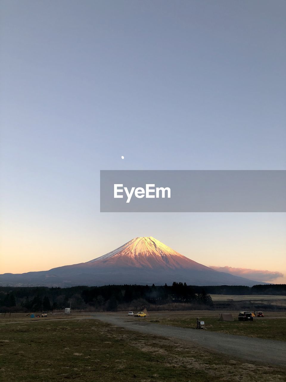 Scenic view of landscape against sky during sunset