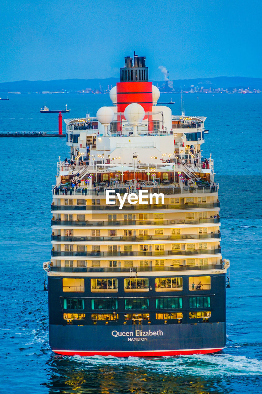 VIEW OF SHIP IN SEA AGAINST BLUE SKY