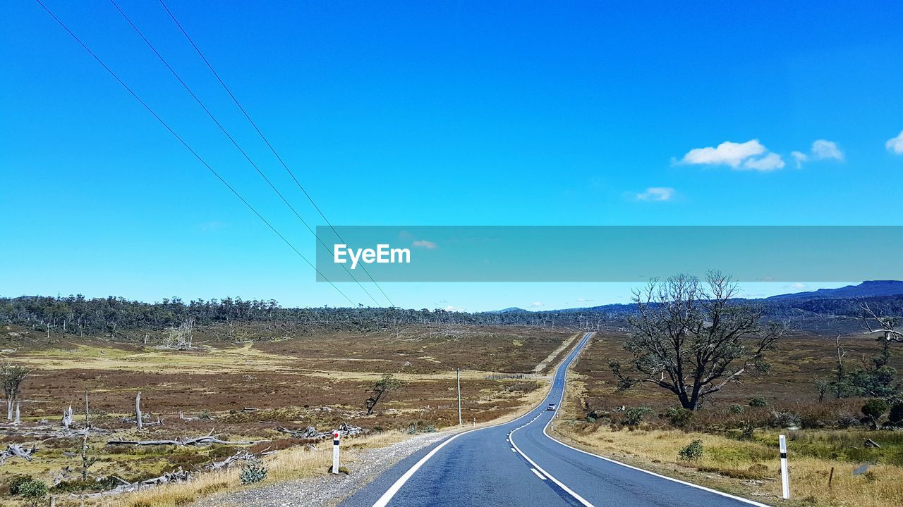 ROAD AGAINST CLEAR SKY