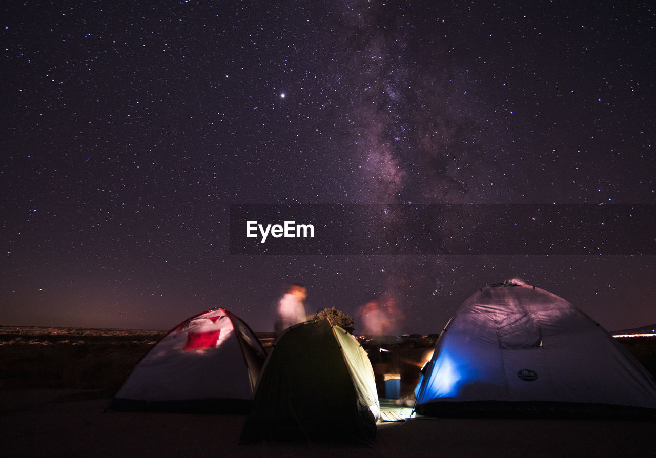 TENT IN SKY AT NIGHT