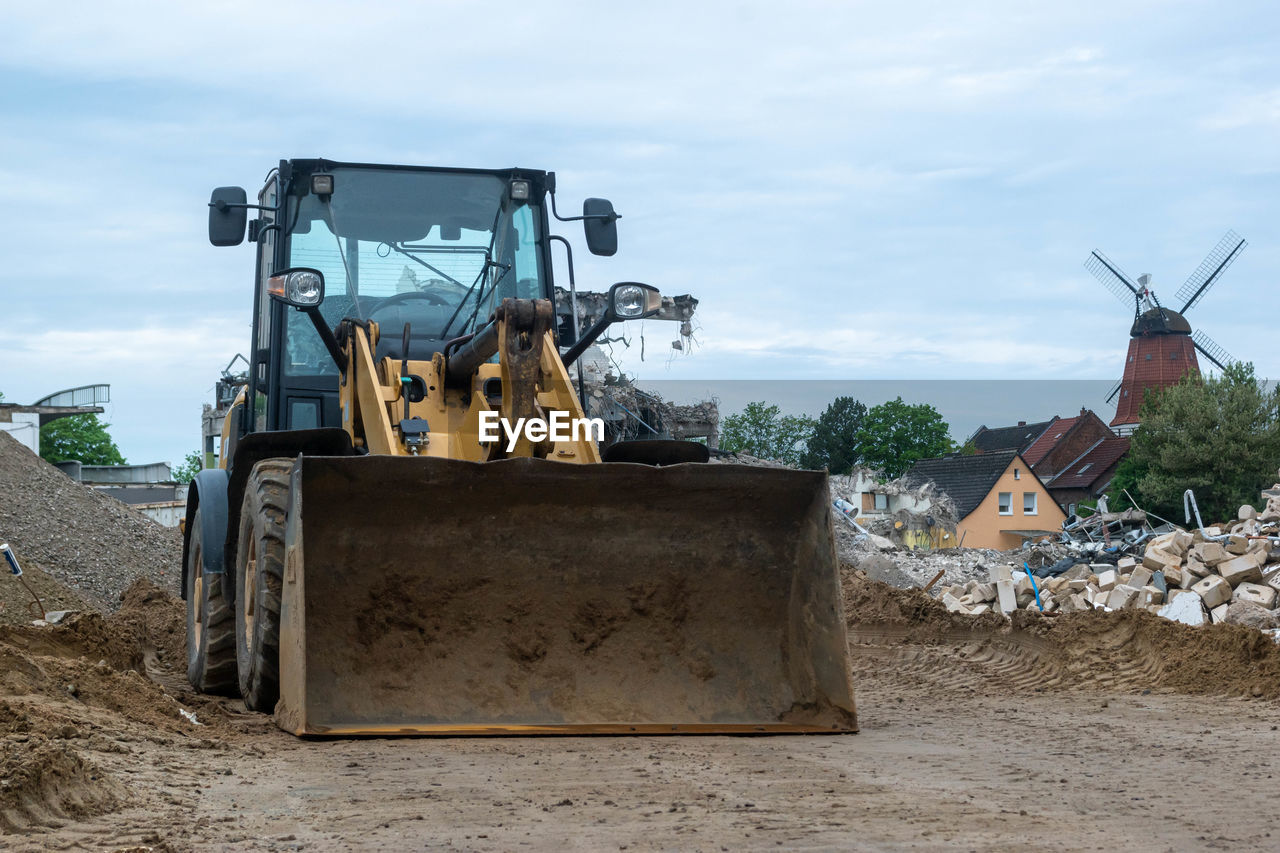 Construction site on field against sky