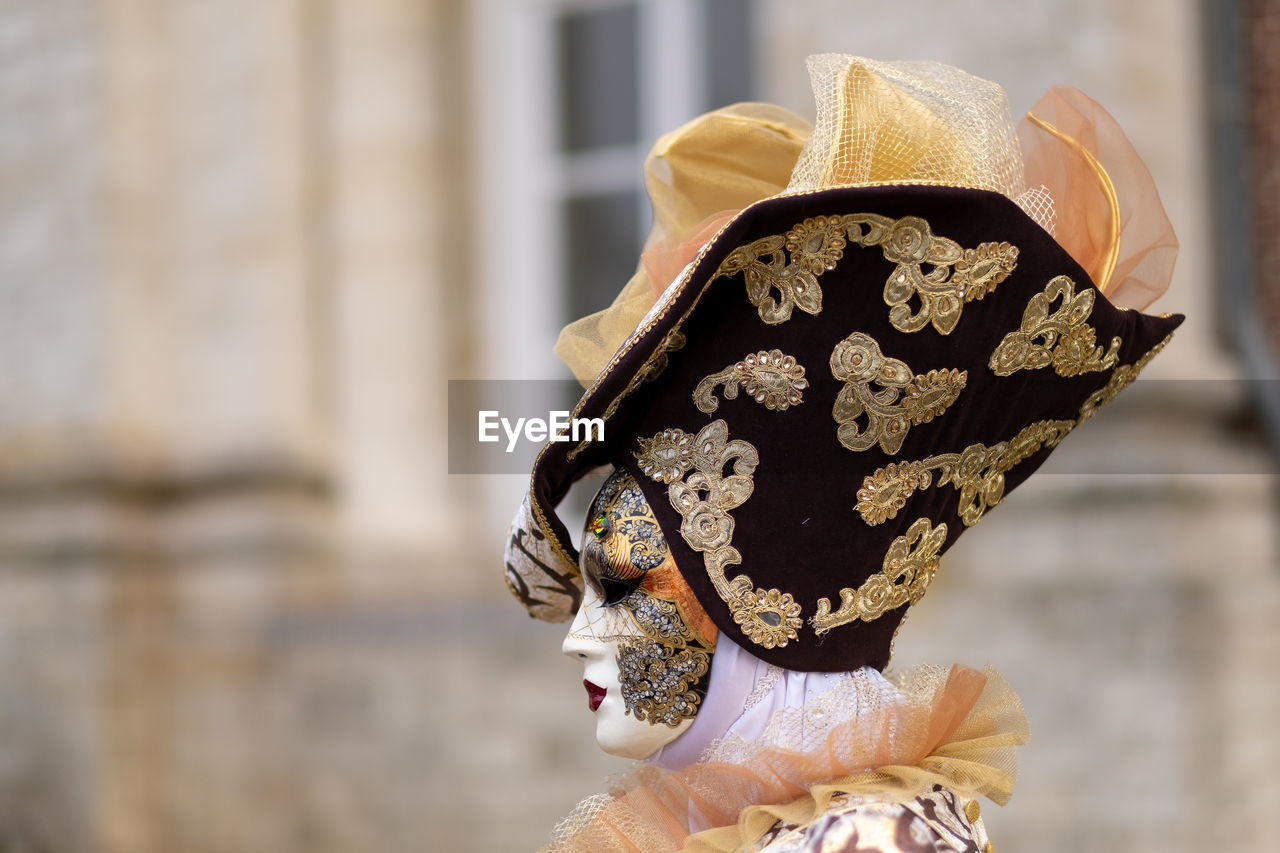 Close-up of woman wearing costume