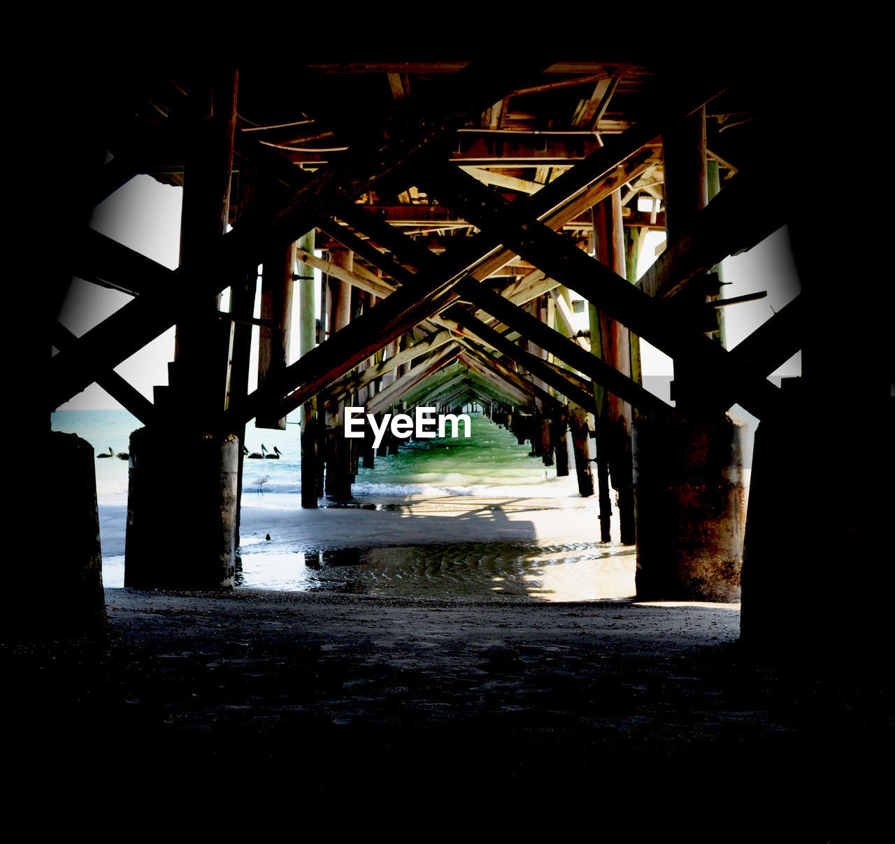 Low angle view of bridge at sea