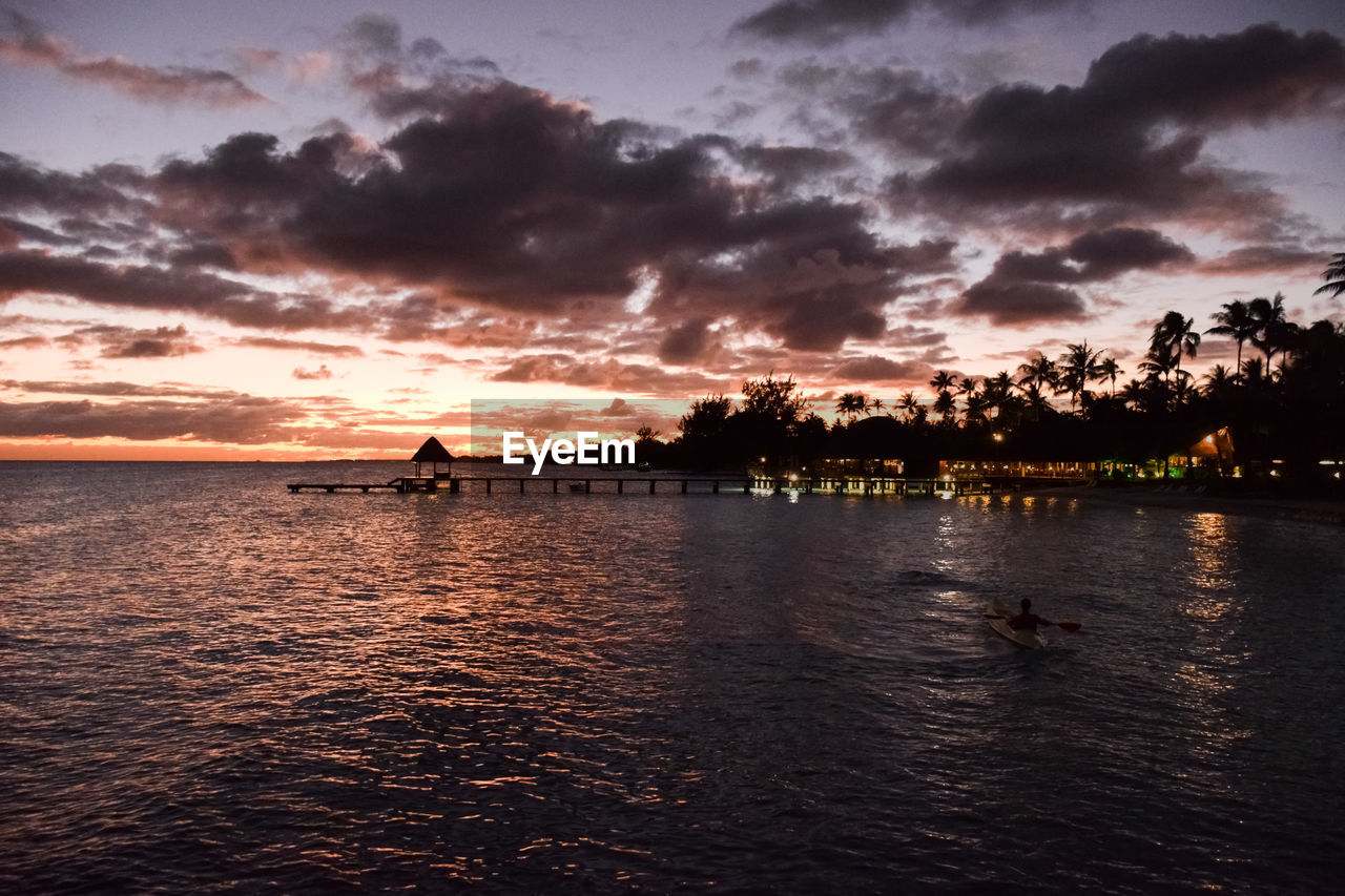 Scenic view of sea against dramatic sky