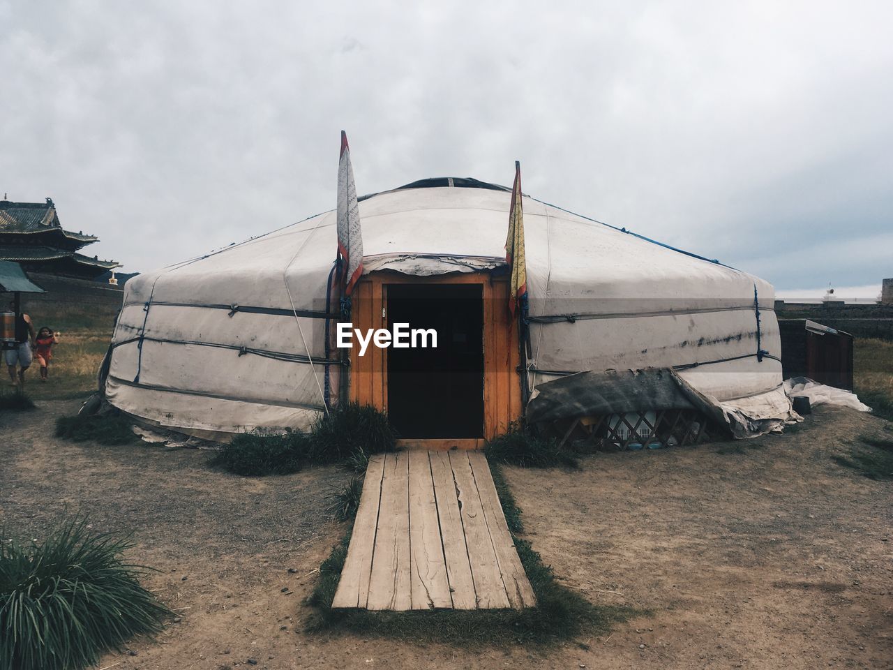 Tent on field against sky