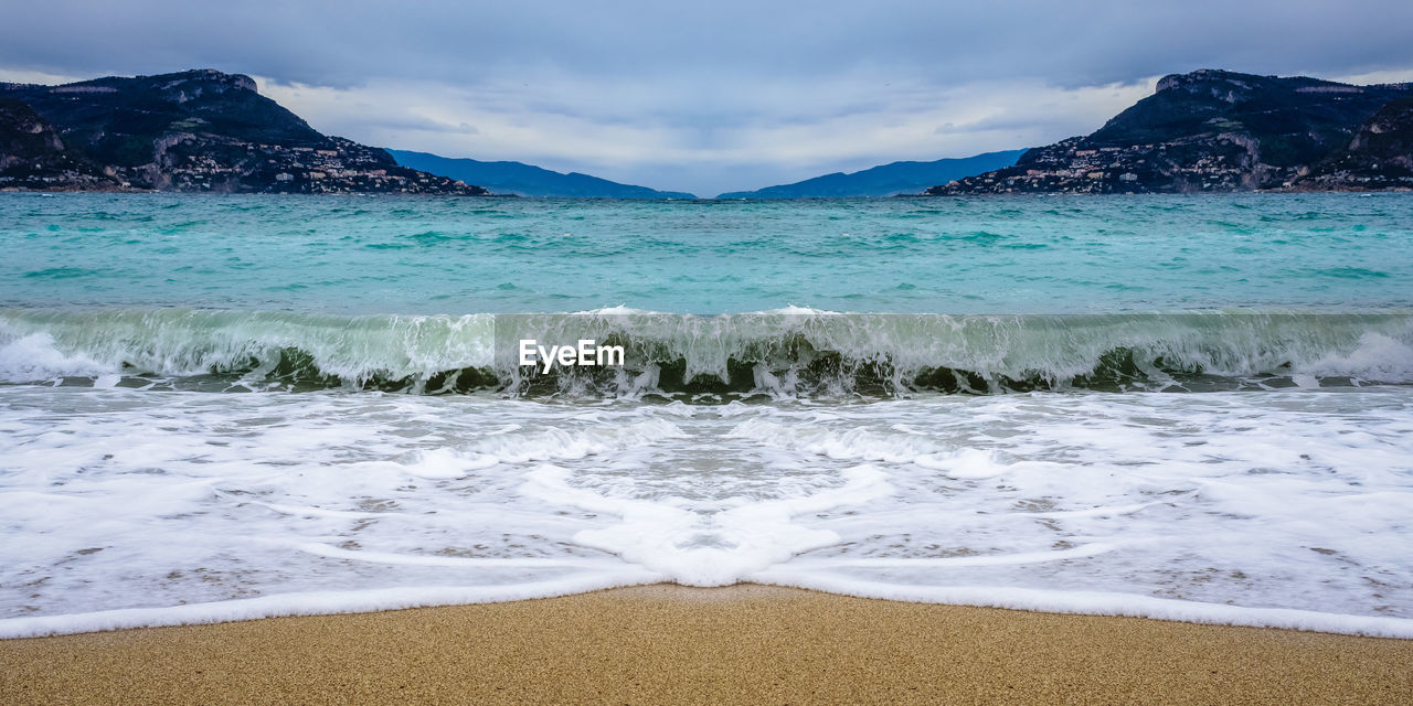 Scenic view of beach against sky