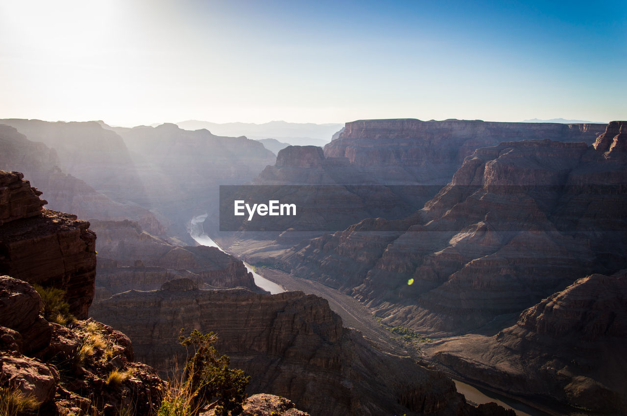 Scenic view of rocky mountains at grand canyon national park against clear sky