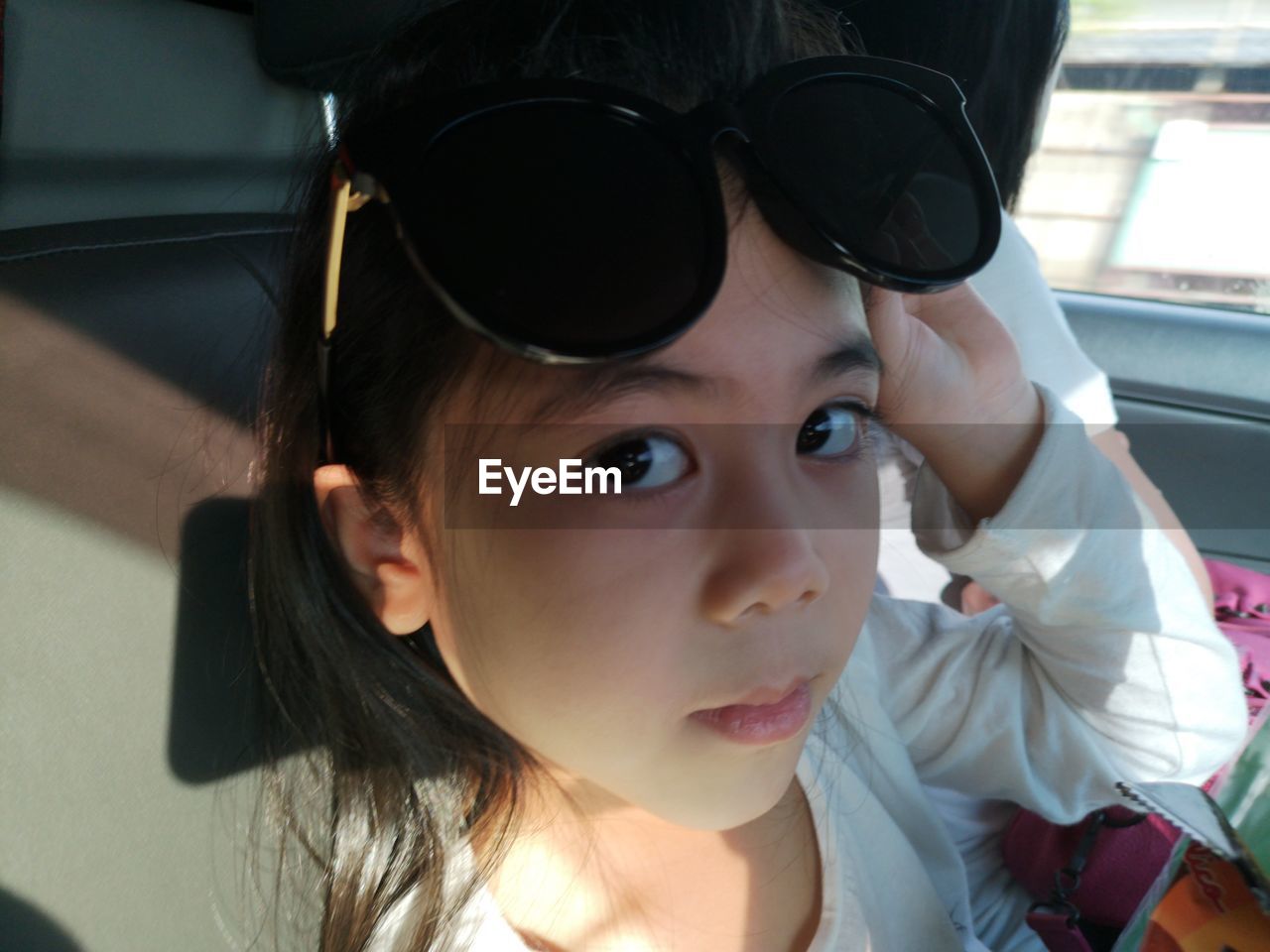 Portrait of girl wearing sunglasses