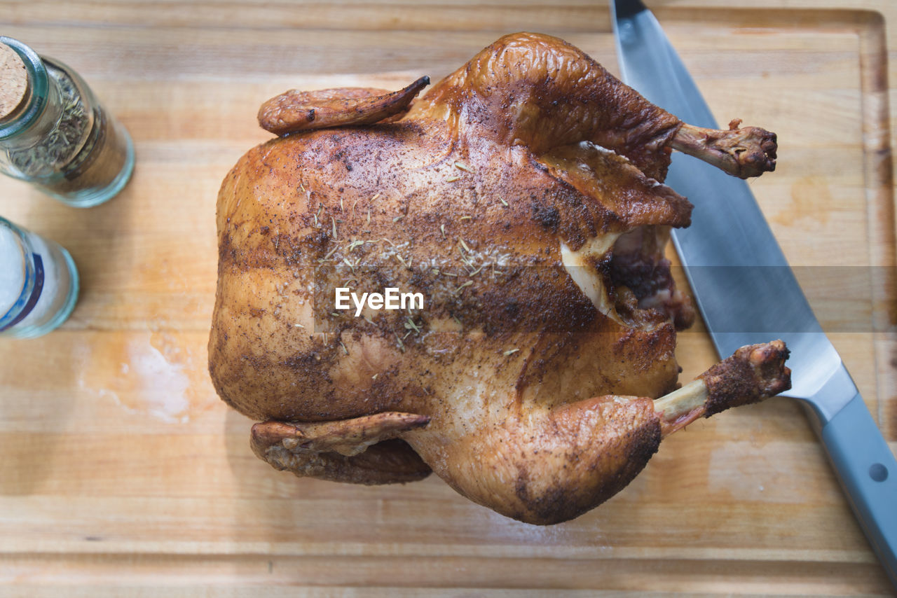 HIGH ANGLE VIEW OF MEAT ON TABLE