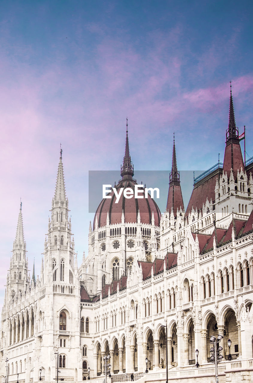 Low angle view of hungarian parliament against sky